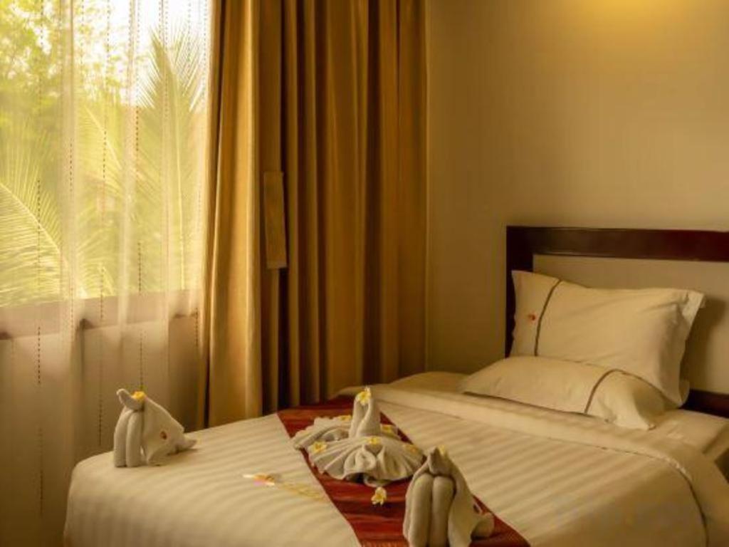 Xishuangbanna Hotel Managed By Xandria Hotel Luang Prabang Dış mekan fotoğraf